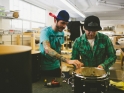 jon putting metal band on drum top with mike